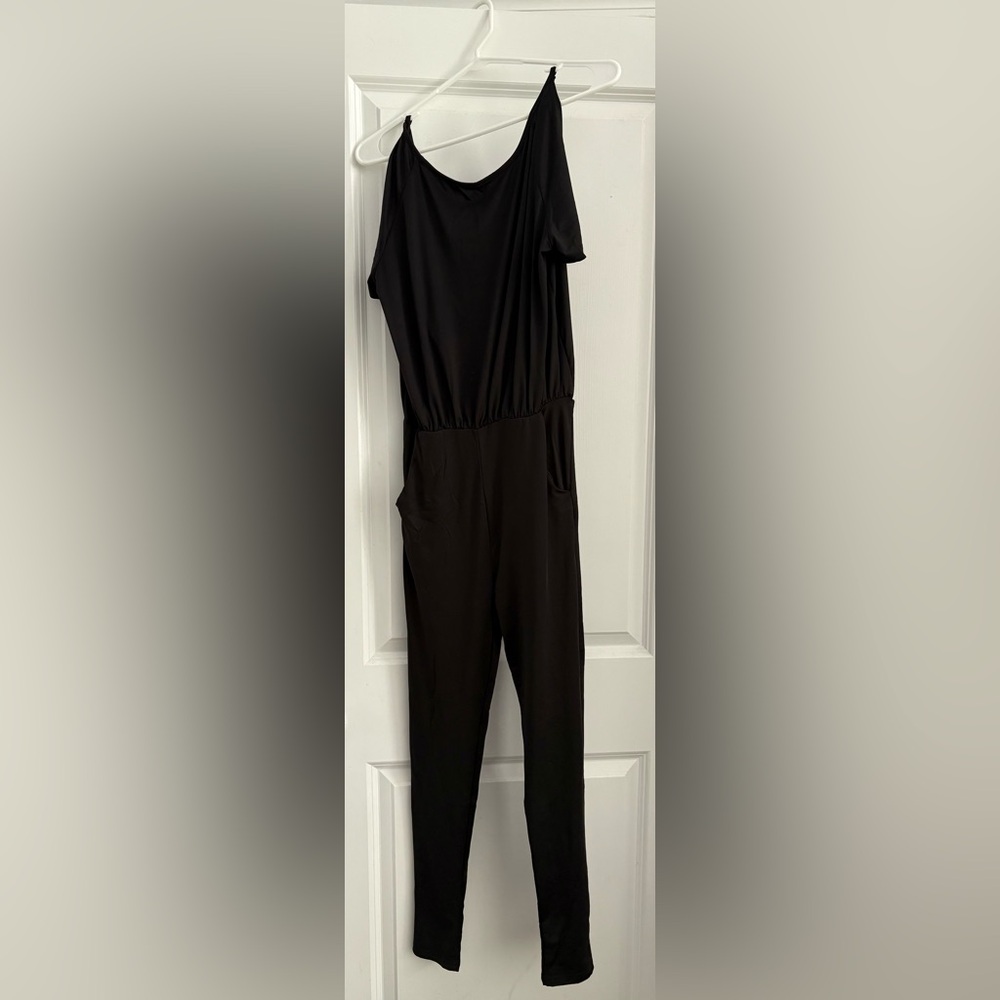 Full length, straight leg, body suit. Short sleeves hang off shoulders
